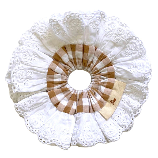 White lace scrunchie with brown and white checks on a white background