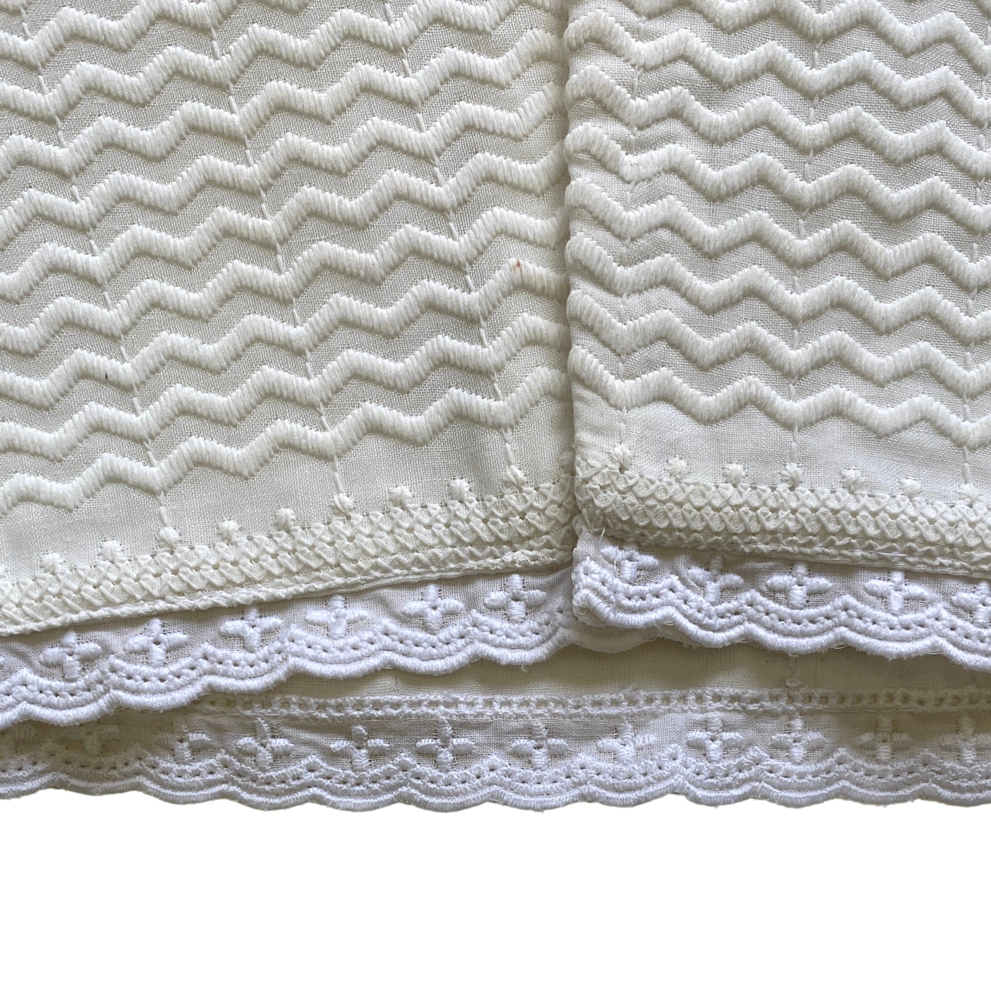 Close-up of coco corset with lace trim on a white background