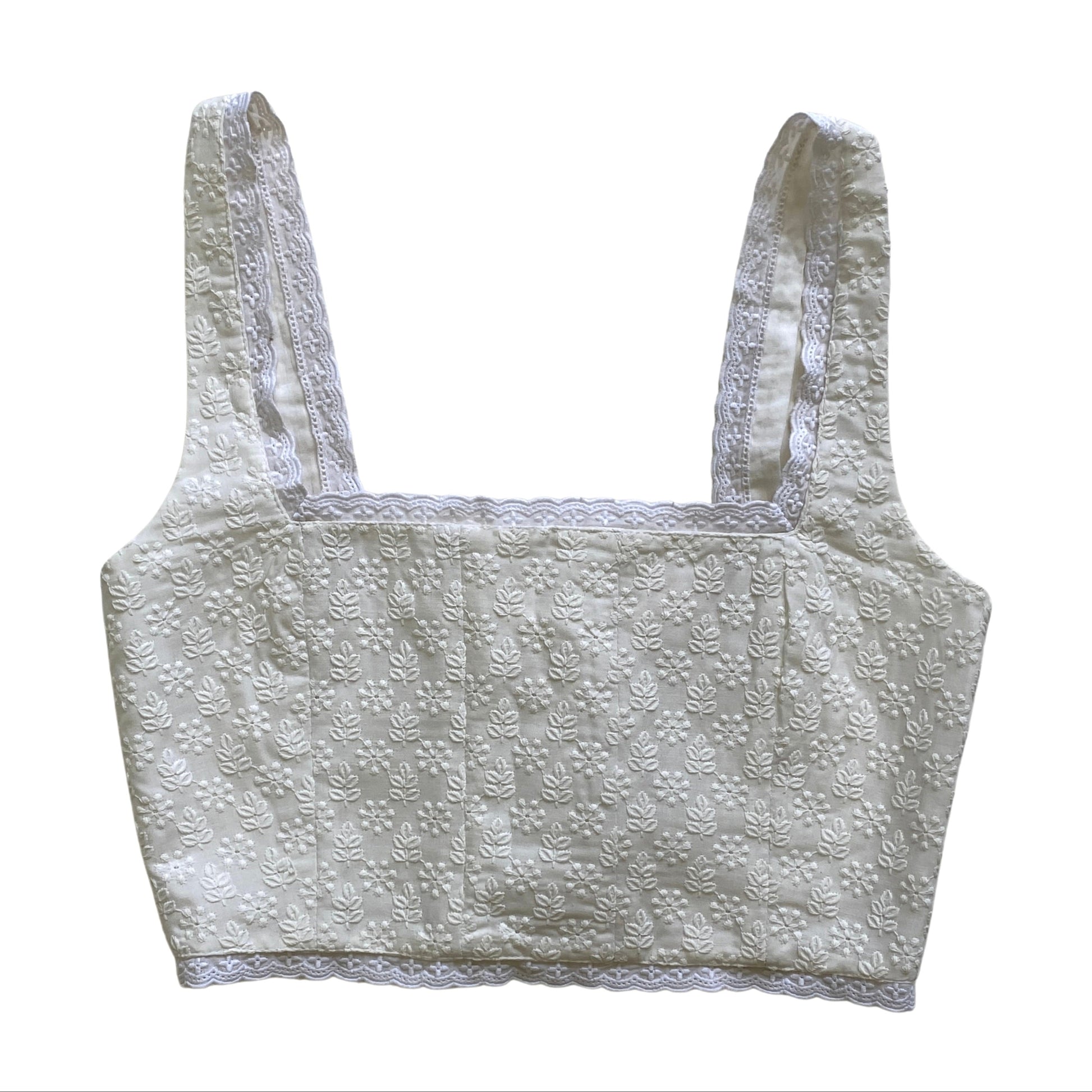 Embroidered white corset top with boning