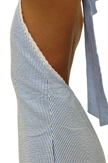 Blue and white striped jumpsuit with lace trim on a white background