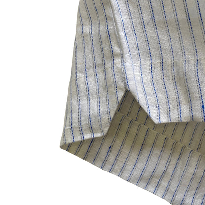 Close-up of a striped linen short with blue stripes on a white background