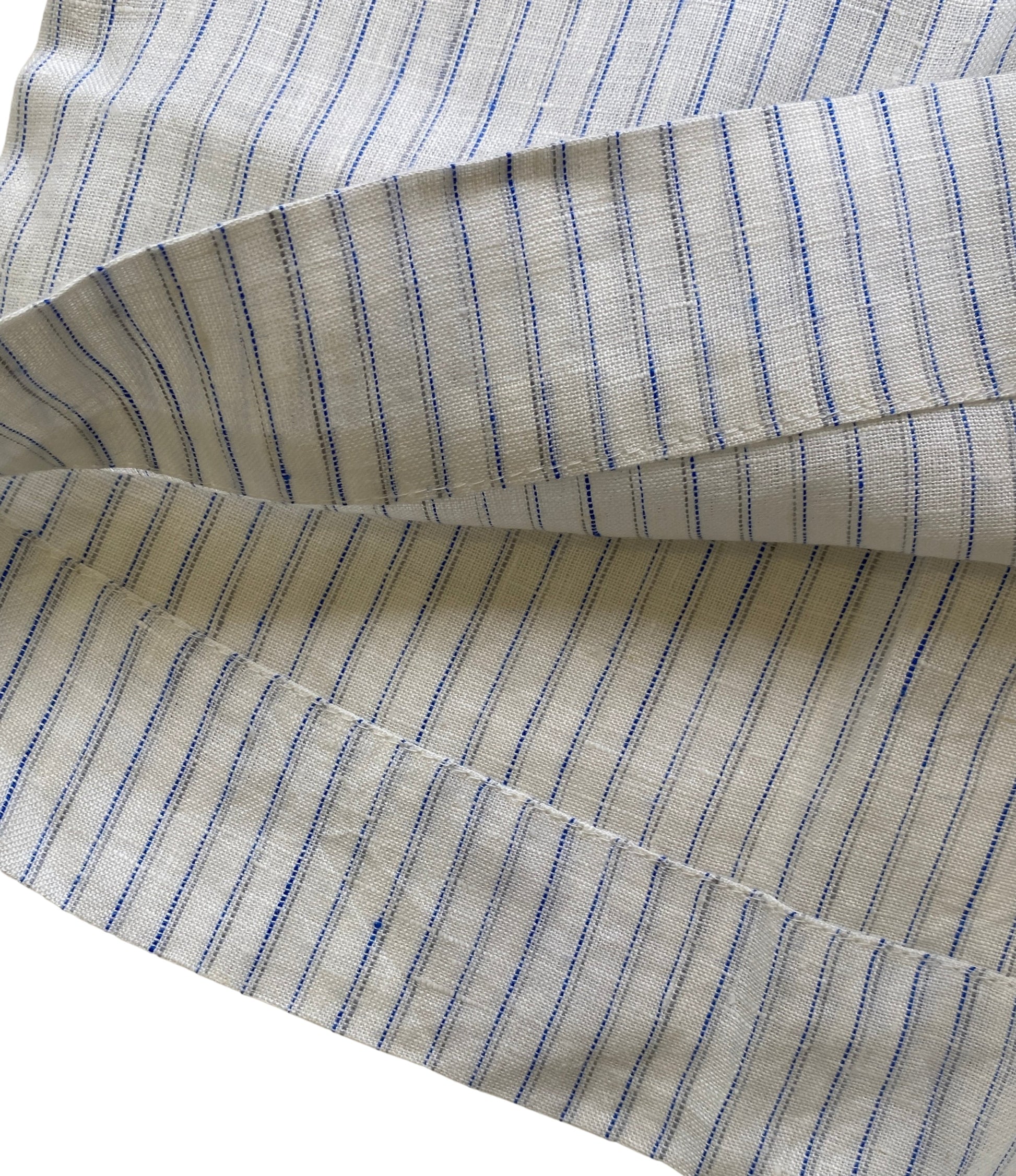 Close-up of striped linen short with blue lines on a white background