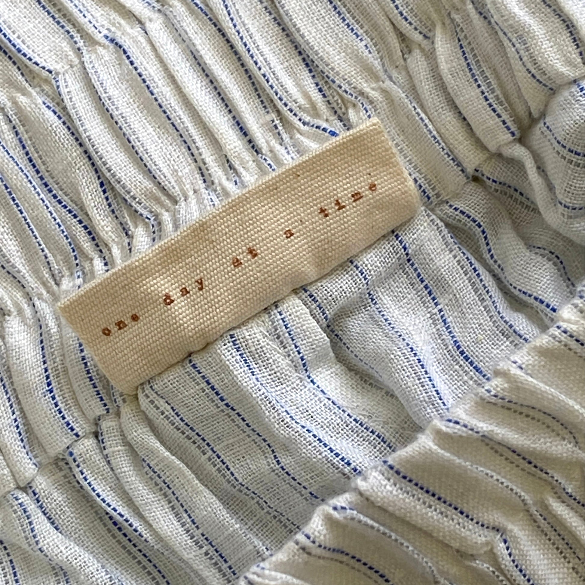 jijo label on striped linen short 