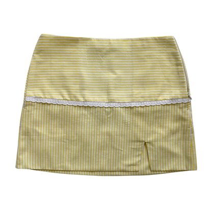 Striped seersucker skirt with lace trim on a white background