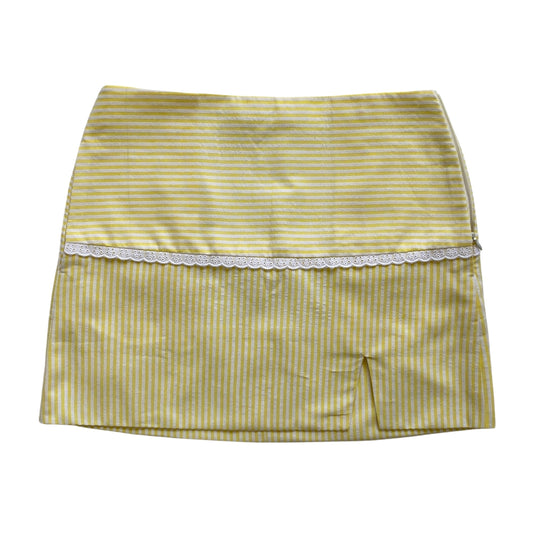 Striped seersucker skirt with lace trim on a white background